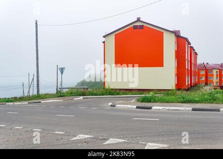 cityscape of seaside village of Yuzhno-Kurilsk on the island of Kunashir Stock Photo