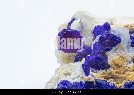 Macro blue azurite cluster on white matrix isolated crystal on black background Stock Photo