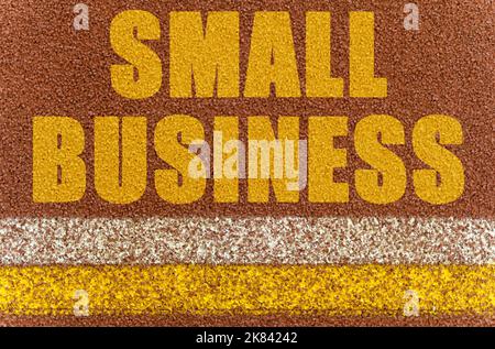 Business and finance concept. On the treadmill, lines and an inscription - SMALL BUSINESS Stock Photo