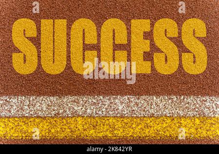 Business and finance concept. On the treadmill, lines and an inscription - SUCCESS Stock Photo