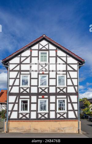 outdoor view to old medieval historic half timbered houses in Herleshausen, Germany.