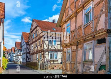 outdoor view to old medieval historic half timbered houses in Herleshausen, Germany.