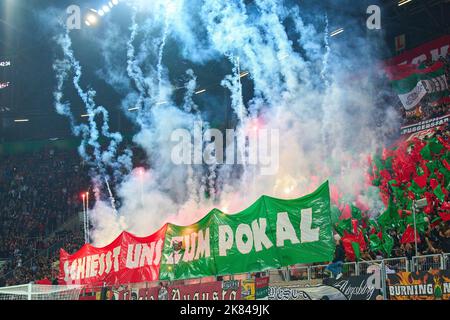 FCA fans with Sportwetten ad in the match DFB Cup second round FC AUGSBURG -  FC BAYERN MUENCHEN 2-5 DFB-Pokal, German Football Trophy on Oct 19, 2022 in Augsburg, Germany. Season 2022/2023, 2.Runde,  © Peter Schatz / Ģ����ý Live News   DFB regulations prohibit any use of photographs as image sequences and/or quasi-video. Credit: Peter Schatz/Ģ����ý Live News Stock Photo