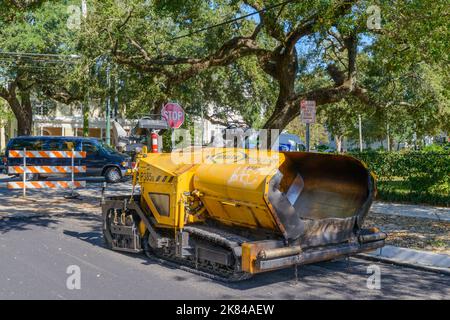 NEW ORLEANS, LA, USA - OCTOBER 14, 2022: Caterpillar asphalt paving machine in Uptown New Orleans Stock Photo