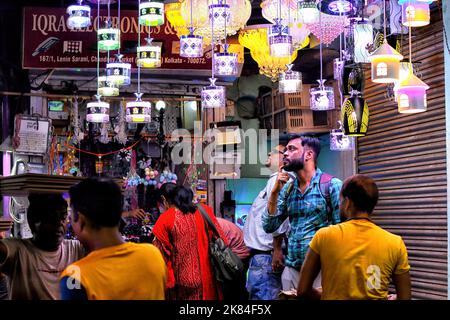 Customers look at lanterns and Diwali decorations on display at a shop. Diwali is the biggest Indian festival of lights, usually lasting five days starting from 24th October this year. Diwali is celebrated to spiritually signify the victory of light over darkness, good over evil. Furthermore, it is a celebration of the day Rama returned to his kingdom in Ayodhya with his wife Sita and his brother Lakshmana after defeating the demon Ravana in Lanka and serving 14 years of exile as per Hindu mythology. (Photo by Avishek Das/SOPA Images/Sipa USA) Stock Photo
