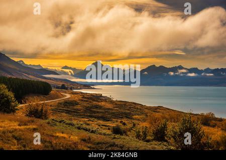 lots of different cloud formations over Aoraki Mt Cook National park during the golden hour Stock Photo
