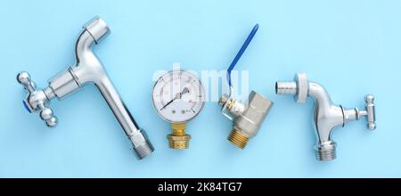 Set of plumber equipment on light blue background, top view Stock Photo