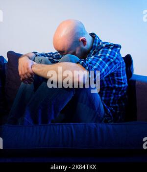 PICTURE POSED BY A MODEL File photo dated 09/03/15 of a man showing signs of depression. The Scottish Government has to make more progress in moving back towards face-to-face mental health treatment after the pandemic, campaigners have said. People suffering from mental health issues in the pandemic were forced to receive treatment remotely due to the risks of spreading the virus. Issue date: Friday October 21, 2022. Stock Photo