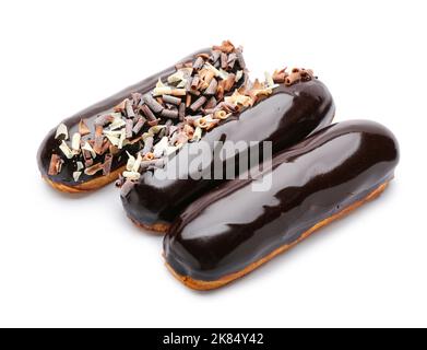 Delicious eclairs in chocolate glaze isolated on white background Stock Photo