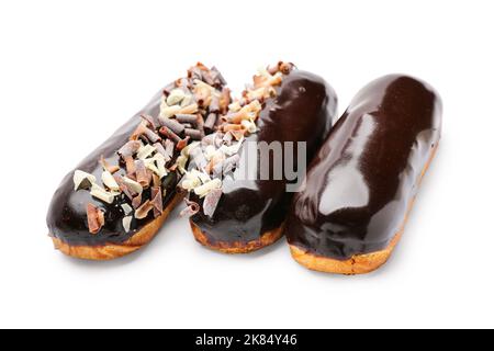 Delicious eclairs in chocolate glaze isolated on white background Stock Photo