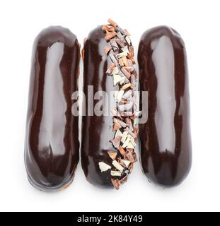 Delicious eclairs in chocolate glaze on white background Stock Photo