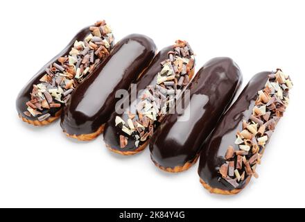 Delicious eclairs in chocolate glaze isolated on white background Stock Photo