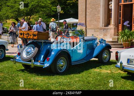 BADEN BADEN, GERMANY - JULY 2022: blue MG TA, TB, TC, TD, TF Midget 1936 roadster cabrio, oldtimer meeting in Kurpark. Stock Photo