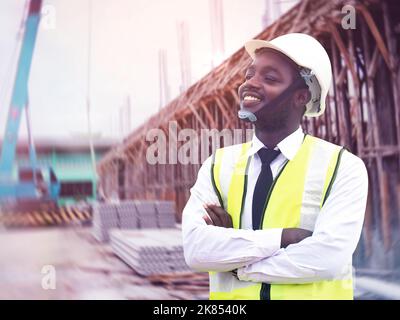 African architects engineer man work together in the inside the construction building site Stock Photo