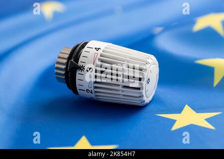 Thermostatic valve on European union flag. Concept of the energy crisis. Stock Photo