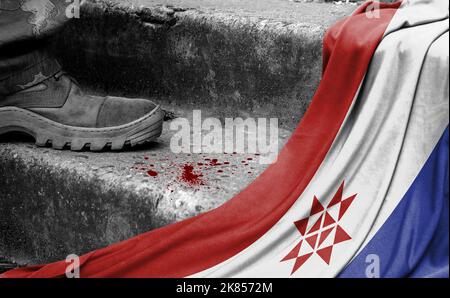 The leg of the military stands on the step next to the flag of Mordovia, the concept of military conflict Stock Photo