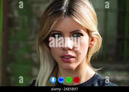 girl talking on a video call in the computer for the background, video chat with a girl Stock Photo