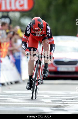 Cadel Evans team BMC crosses the finish line on Stage 19 during the ...