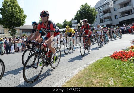 Cadel Evans from team BMC rides ahead of overall leader Chris Froome, team mate Manuel Quinziato and Phillipe Gilbert during stage ten of the Tour De France. Stock Photo