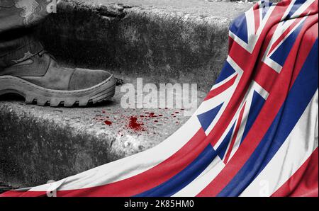 The leg of the military stands on the step next to the flag of State of Hawaii, the concept of military conflict Stock Photo