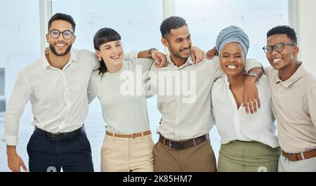Were the only team you need. Cropped portrait of a group of young diverse businesspeople standing together in the boardroom. Stock Photo