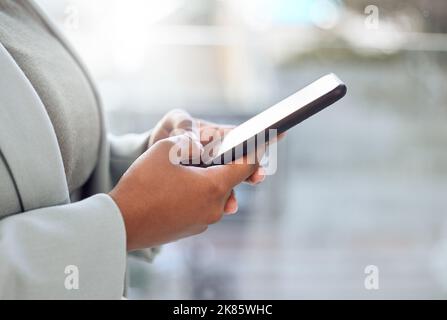 Its never been more important to have an online presence. an unrecognizable woman using her cellphone. Stock Photo