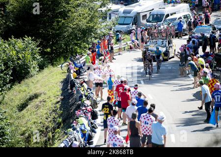 Three riders climb the final kms of the Col de Portillon during Stage 16 of the Tour de France 2018 from Carcassonne to Bagneres de Luchon.  Stock Photo