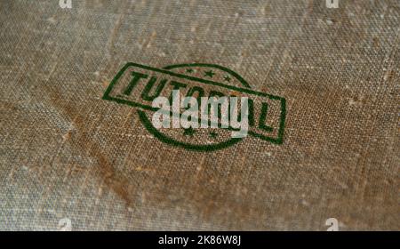 Tutorial stamp printed on linen sack. Online learning and education concept. Stock Photo