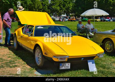 BADEN BADEN, GERMANY - JULY 2022: yellow 1971 DETOMASO PANTERA sport car, oldtimer meeting in Kurpark. Stock Photo