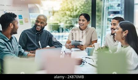You guys are great team members. businesspeople using various technology during a business meeting. Stock Photo