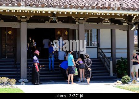 The visitors waiting to enter the temple of the San Jose Buddhist Church Betsuin during the Obon Festival Stock Photo