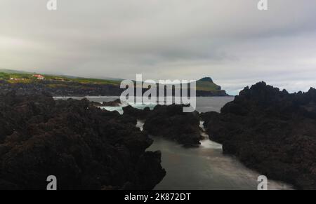 Seashore of the bay of Pombas aka Doves in Long exposure at Terceira island, Azores, Portugal Stock Photo