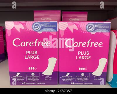 Nuremberg, Germany - March 03, 2022: Assorted a Carefree sanitary napkins or pantyliners display for sell in the supermarket shelf. Stock Photo