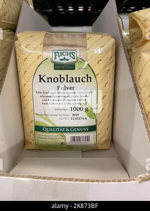 Nuremberg, Germany - March 03, 2022: Garlic Powder in package for sale. Garlic Powder Translation: Knoblauchpulver. Stock Photo