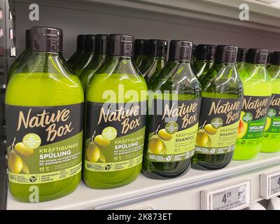 Nuremberg, Germany - March 03, 2022: Nature Box hair conditioner pomegranate on a shelf. Stock Photo