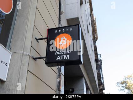 A sign for a Bitcoin ATM site in Barcelona, Spain Stock Photo