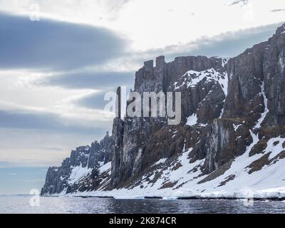 The famous bird cliffs at Alkefjellet, literally meaning Mountain of the Guillemots, Svalbard, Norway, Europe Stock Photo