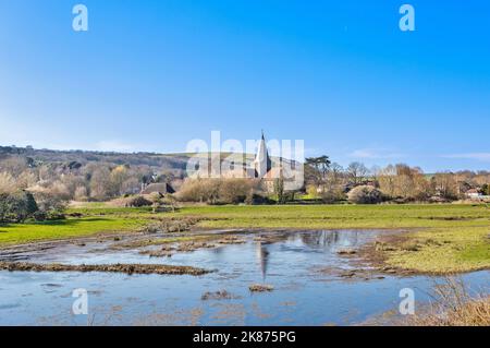 St. Andrew's Church, Alfriston, seen across the River Cuckmere, East Sussex, England, United Kingdom, Europe Stock Photo