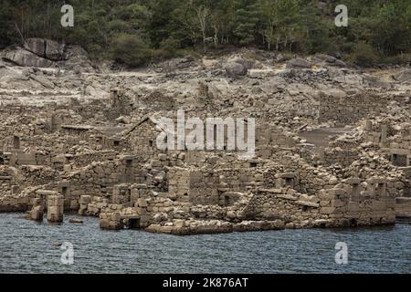 Abandoned old village of Vilarinho da Furna, Portugal. Submerged since 1971 because of the dam construction, emerged due to the current drought Stock Photo