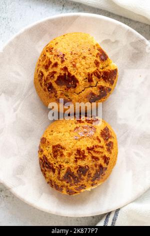 Turkish black cumin pogaca. Traditional flavors. Pogaca on gray background. Top view Stock Photo