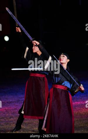 Suwon, Gyeonggi-do - 10 07 2022: Two women dance with swords in the musical 'Yajo: Jeongjo opens a new world' Stock Photo