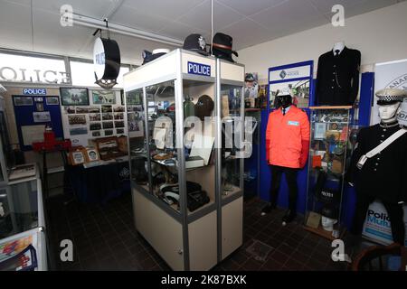 Cumnock, Ayrshire, Scotland, UK Jim Manson (80) a former Police officer with his collection of Police Memorbilia from Strathcylde & Lanarkshire Constabulary. Inside a rented industrial unit he has created a mini Police station complete with prison cell Stock Photo