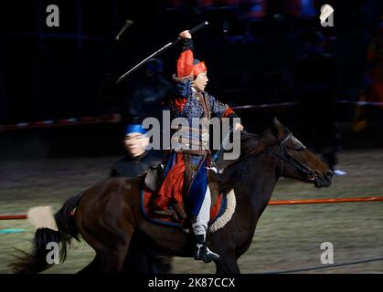 Suwon, Gyeonggi-do - 10 07 2022: A person is riding a horse and rising its sword in the musical 'Yajo: Jeongjo opens a new world' Stock Photo