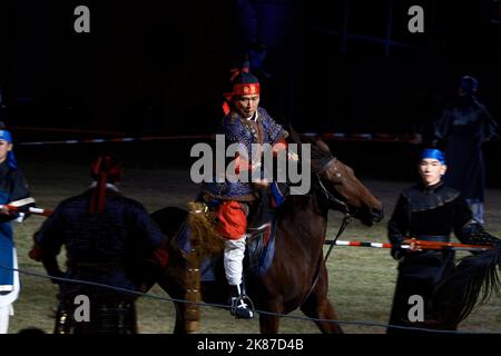 Suwon, Gyeonggi-do - 10 07 2022: A man is riding a horse and swinging his sword in the musical 'Yajo: Jeongjo opens a new world' Stock Photo