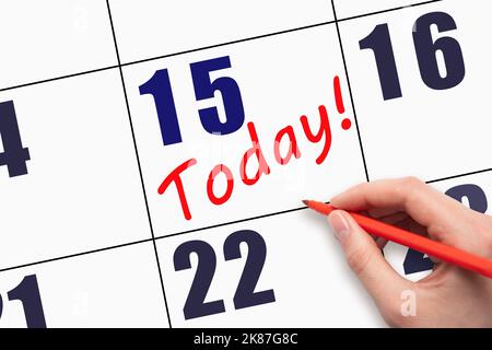 15th day of the month.  Hand writing text TODAY on calendar date. Save the date. A reminder of the last day. Deadline. Business concept Day of the yea Stock Photo