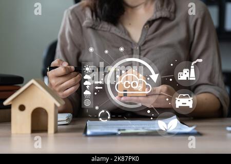 Real Estate Agent showing a energy project for future house. Green energy development concept Stock Photo