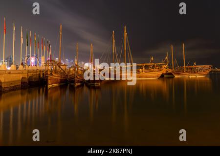 Traditional boats called Dhows are anchored in the Corniche Doha Stock Photo