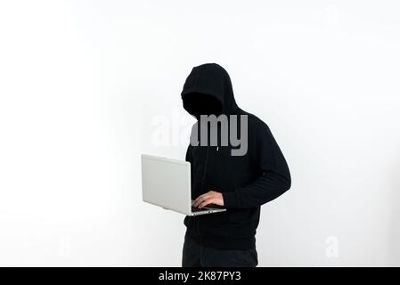 Man Standing With Laptop Presenting Cyber Security. Businessman Thinking Deeply For Information Technology Defence. Guy Brain Storming Brilliant Stock Photo