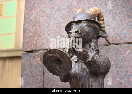 The goat statue holding a trumpet in Lublin, Poland. Stock Photo