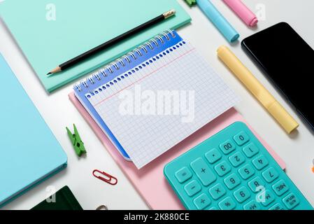 Multiple Assorted Collection Office Stationery Photo With Pens Pencils Notepads Notebook Ruler Stapler Scissors Clippers Paper Clips Holders Clipboard Stock Photo